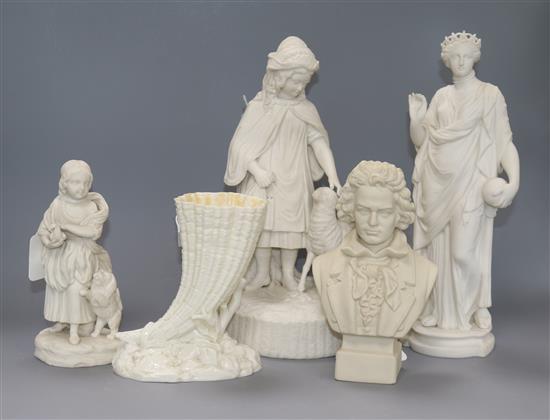 A Royal Worcester Belleek-style cornucopia vase and three items of parian ware, tallest 30cm